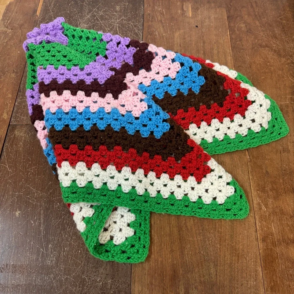 Vintage multicolor crocheted baby blanket with purple flower in center 37